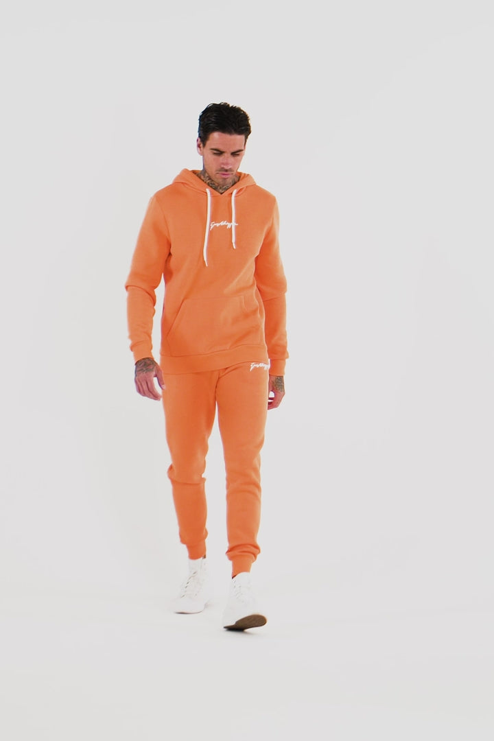 Orange hot sale sweatsuit mens